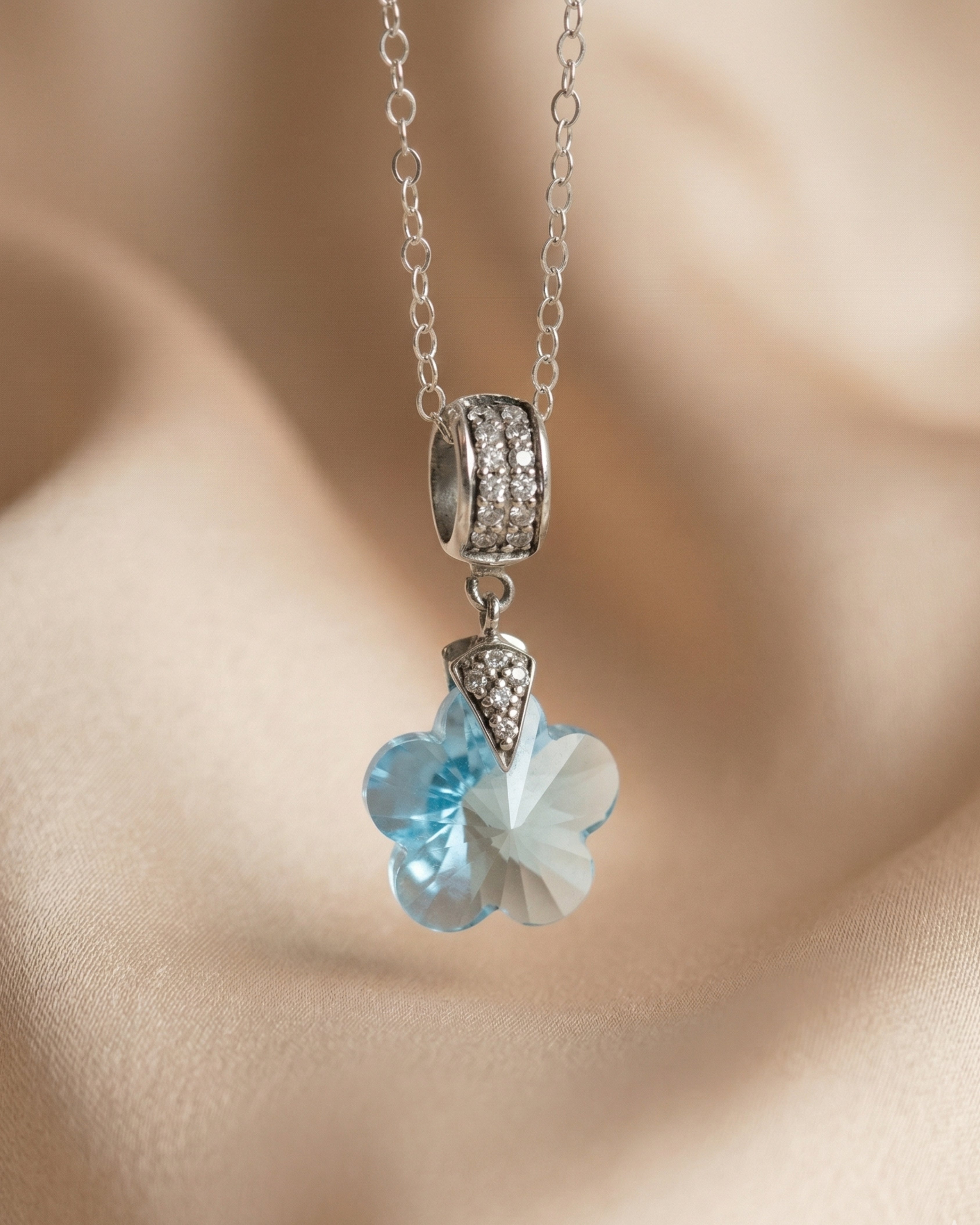 Enchanting Sky Blue Topaz Flower Pendant