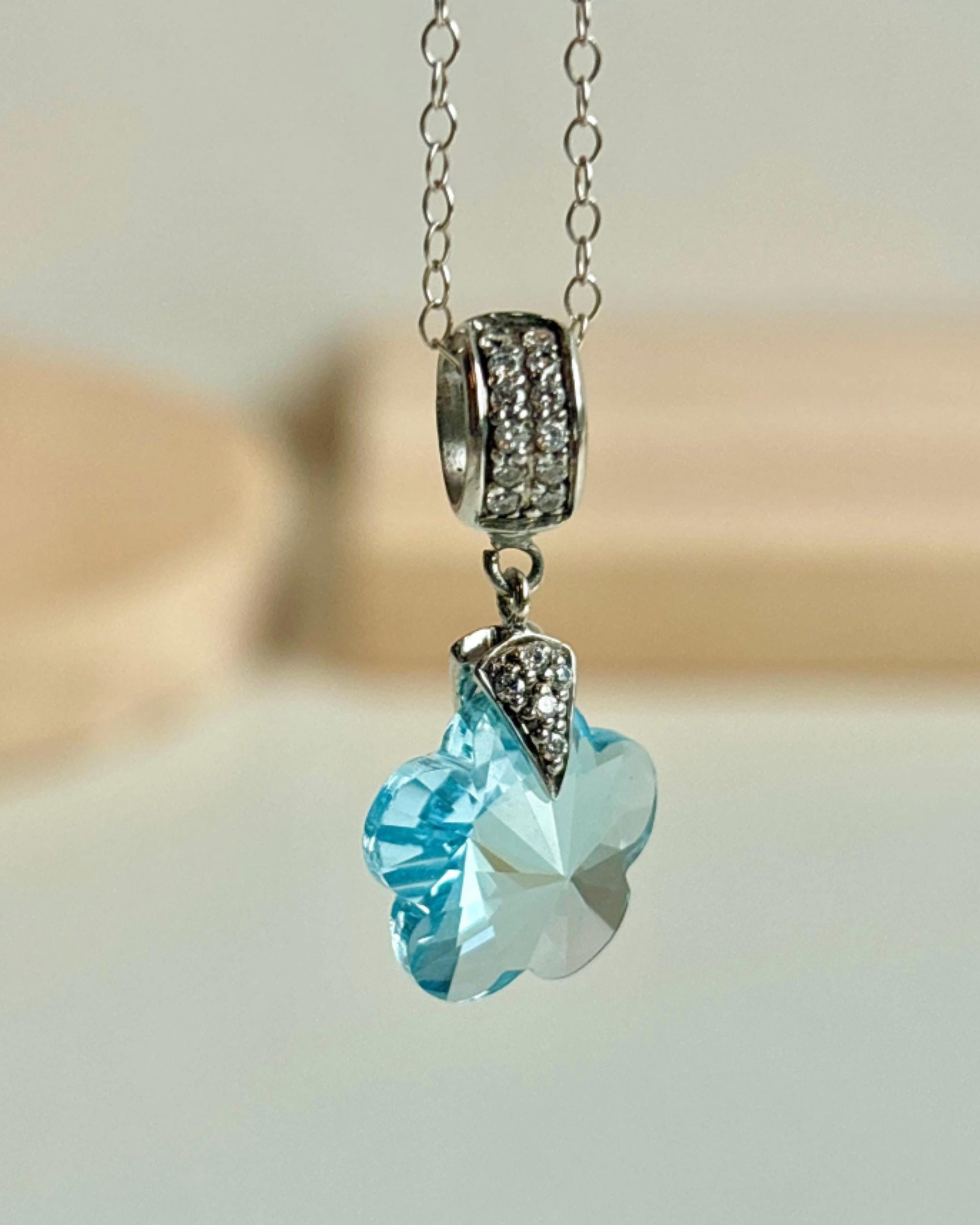 Enchanting Sky Blue Topaz Flower Pendant